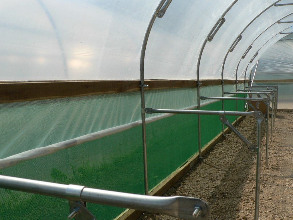 a polytunnel wind break to stop polytunnel blowing away in the wind