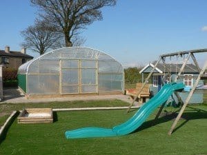 Garden Polytunnel garden polytunnel paired with a play area creates a successful garden transformation
