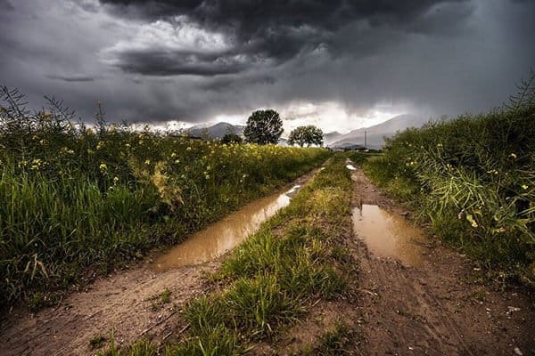 storm clouds and muddy path