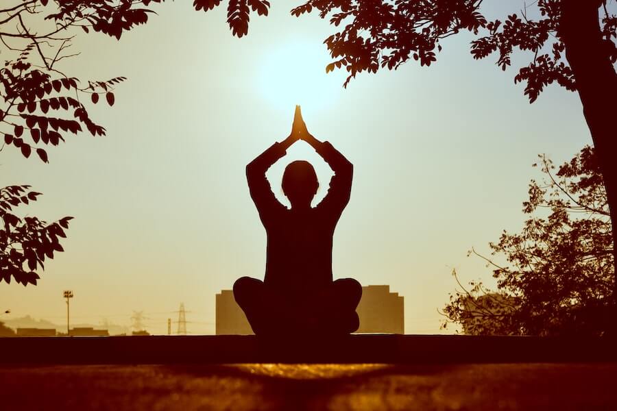woman meditating to help anxiety