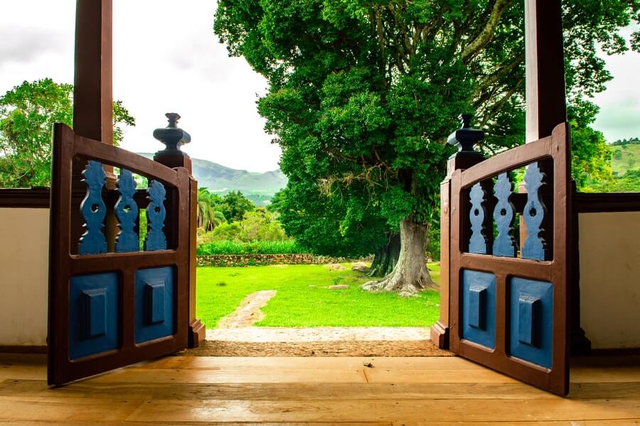 open garden gates showing a sloping garden