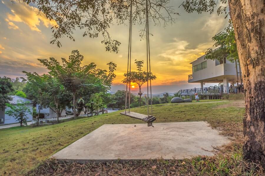 sloping garden with swing